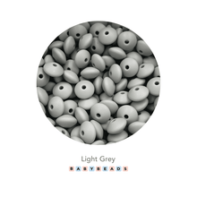 Load image into Gallery viewer, Lentil Silicone Beads 11mm x 6mm.
